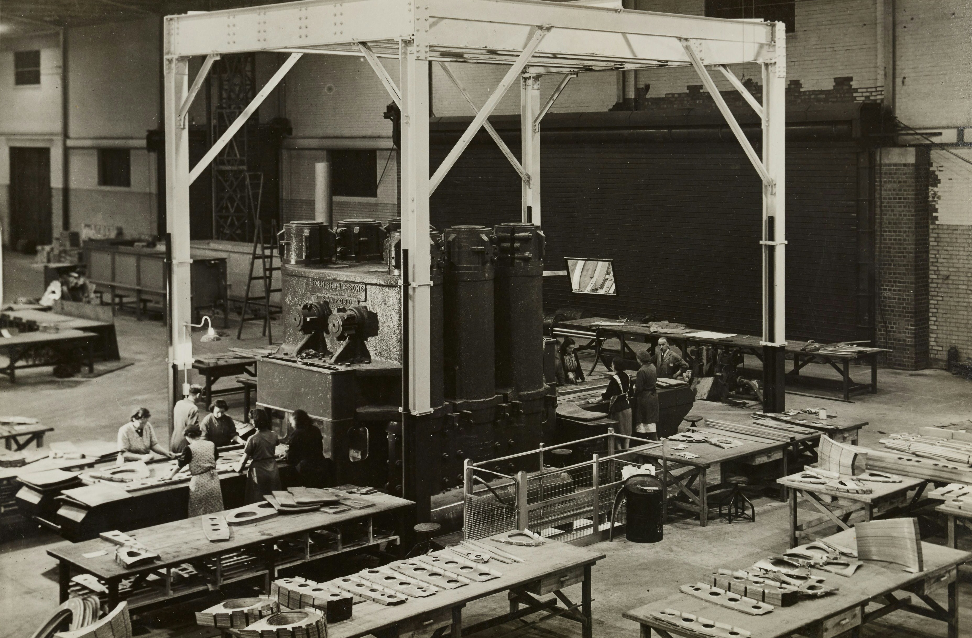 grayscale photo of people inside building