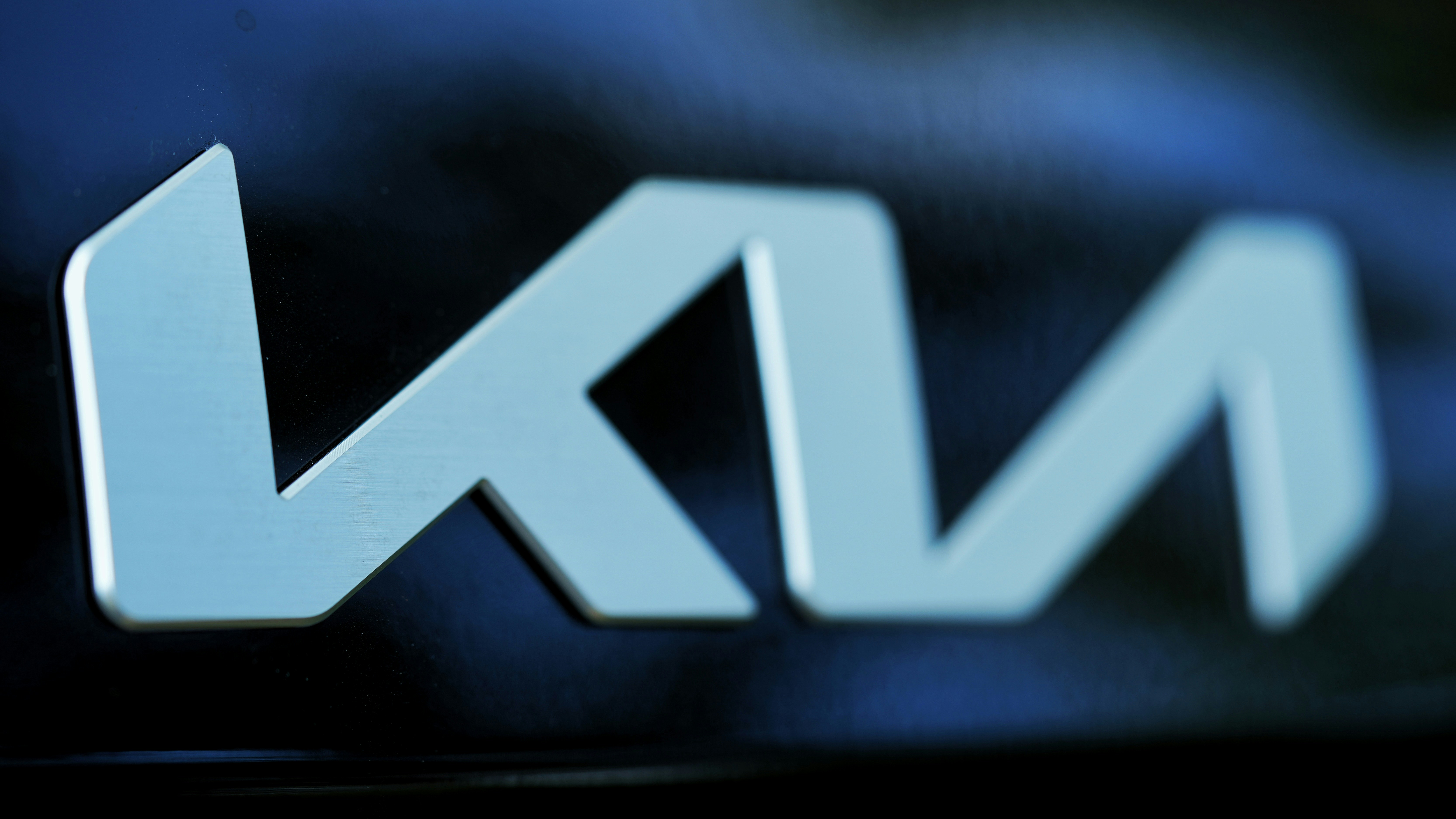 a close up of the letter k on the front of a car