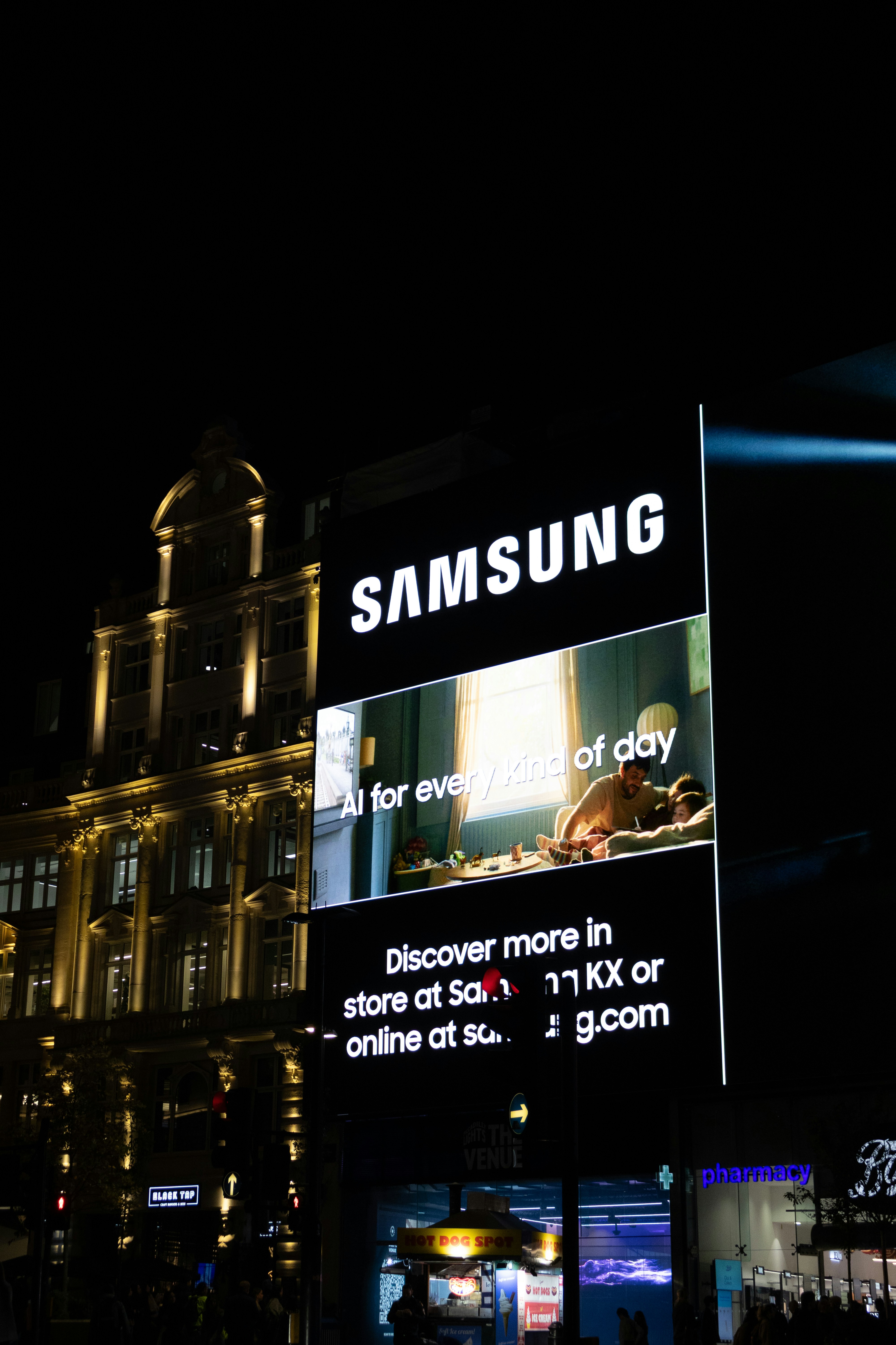 Samsung billboard at night in a city