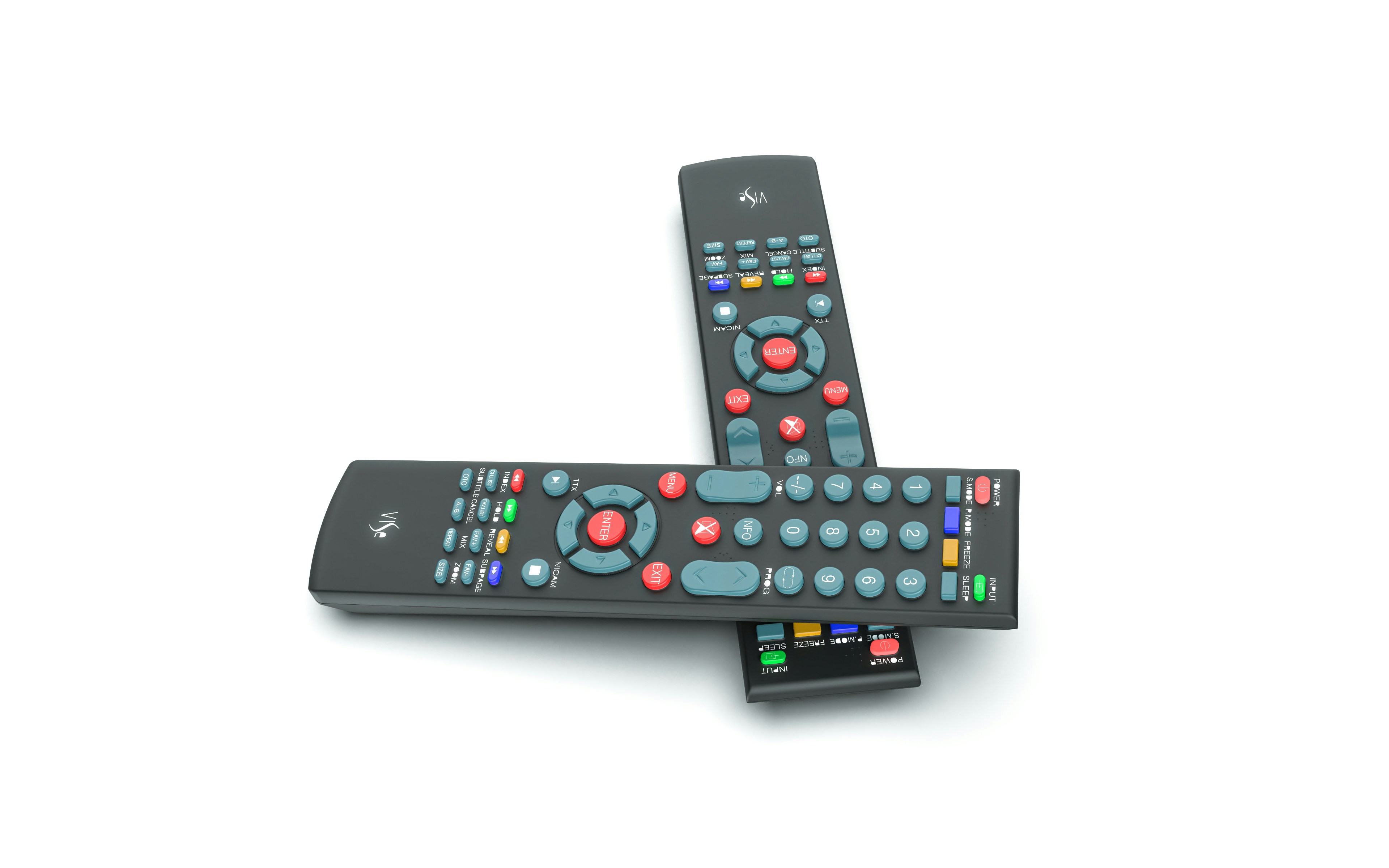 Two remote controls crossed on a white surface.