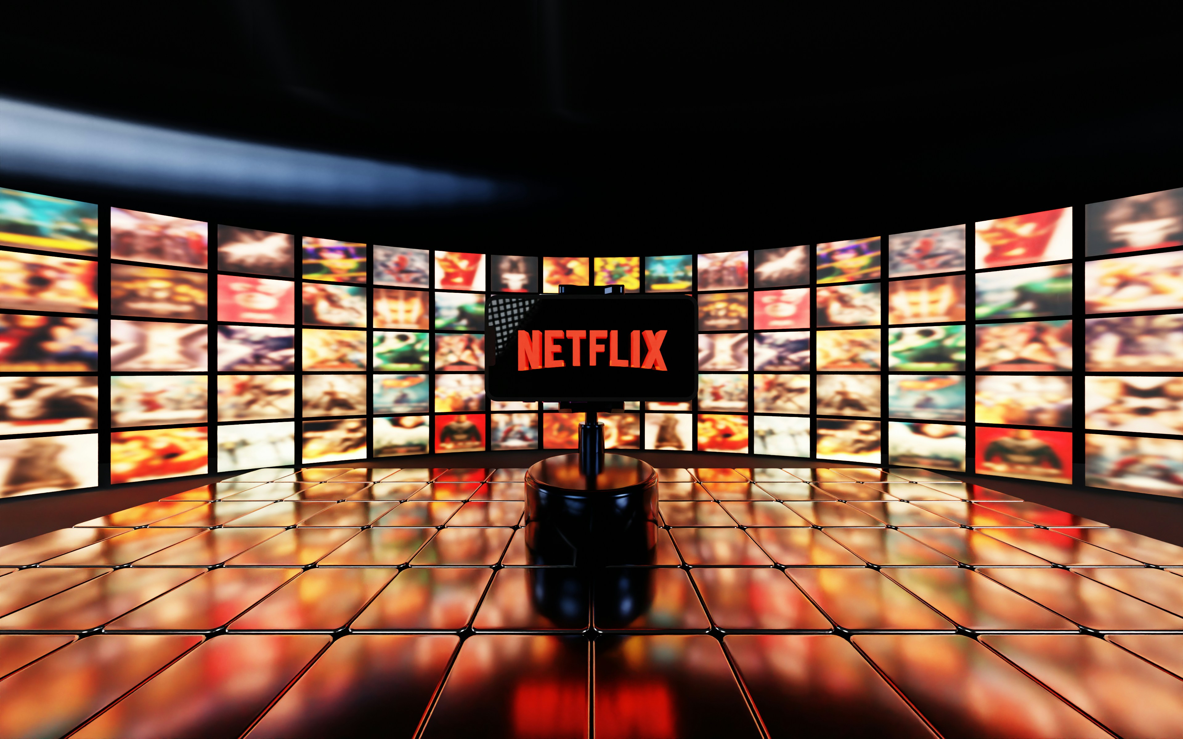 Netflix logo displayed on screen surrounded by movie posters.