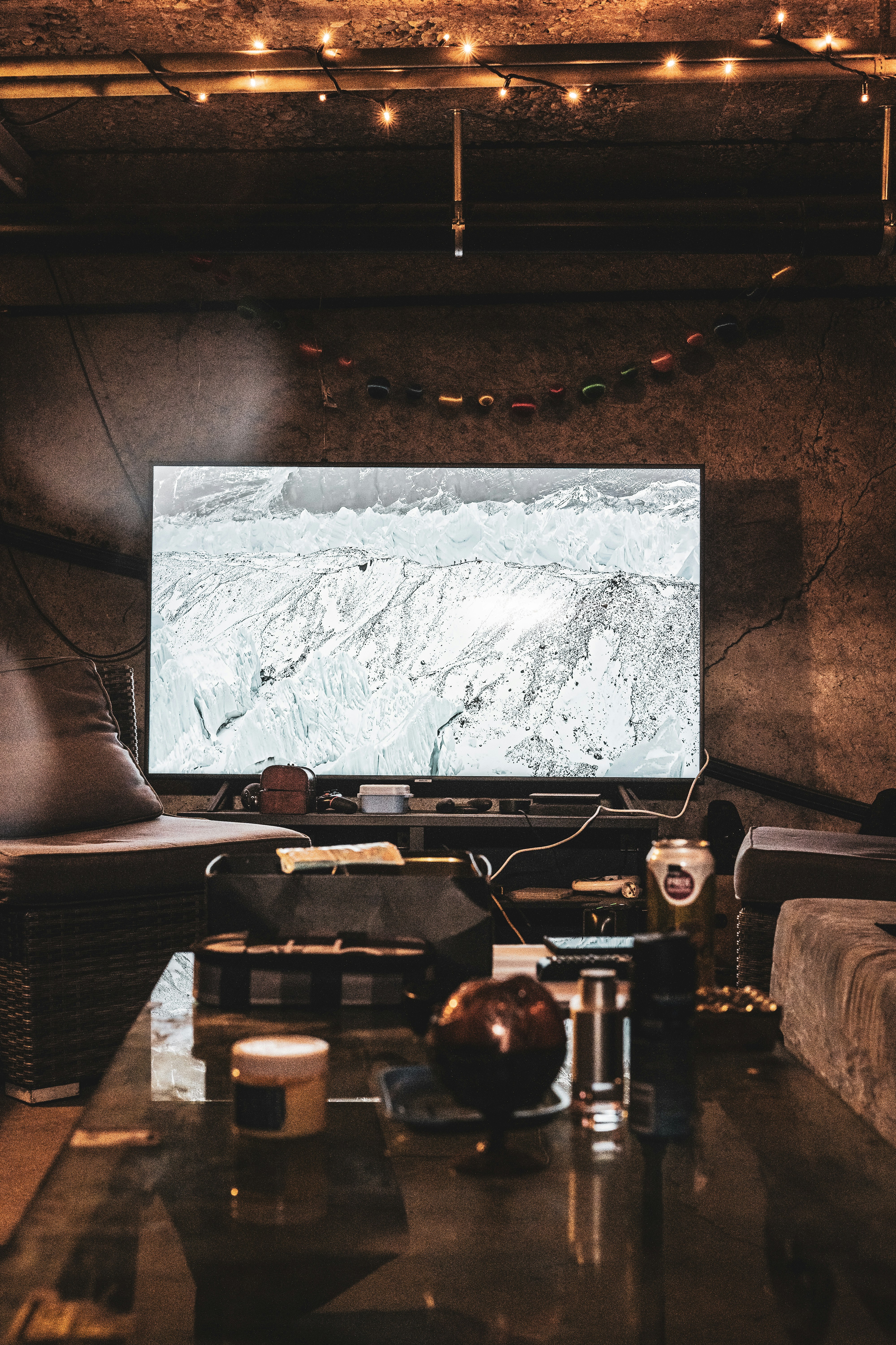 a living room filled with furniture and a flat screen tv