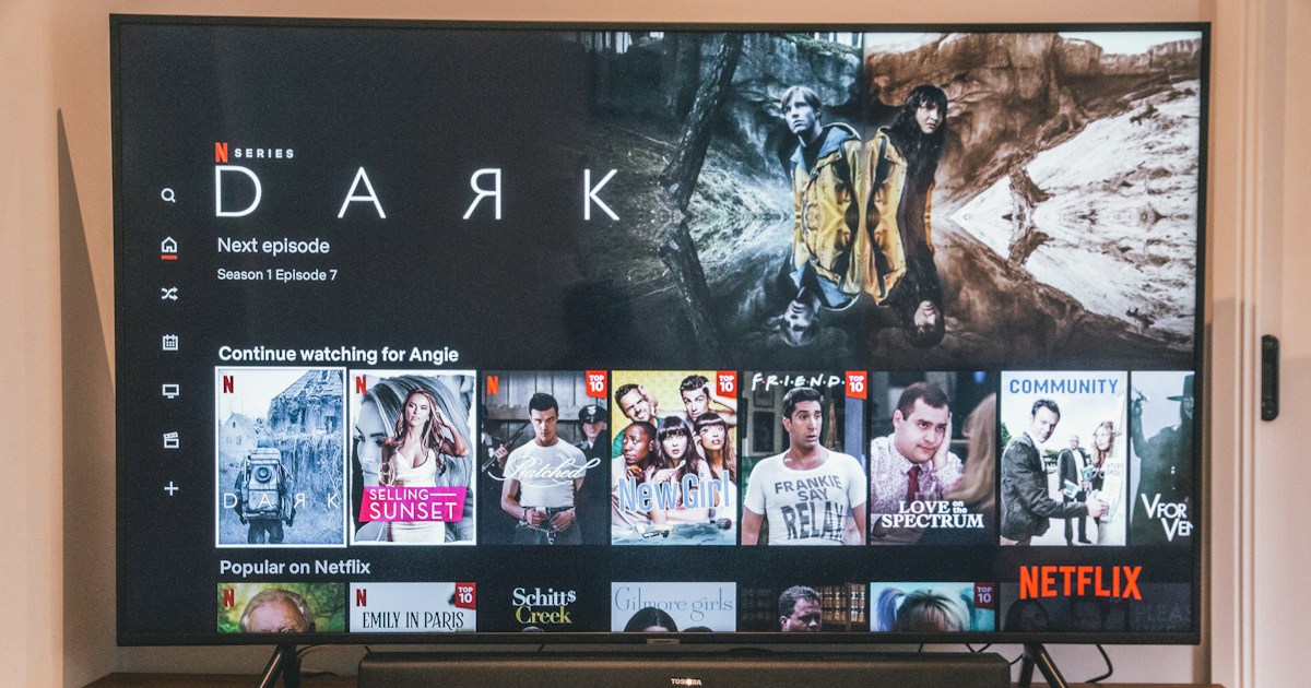 Asian TV Brand Market Leaders by TV Brands black flat screen tv turned on displaying man in black suit
